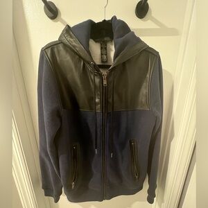 Marc by Marc Jacob’s blue and black faux leather insert zip up hoodie.